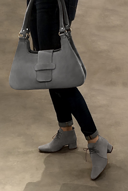 Dove grey women's ankle boots with laces at the front. Round toe. Low flare heels. Worn view - Florence KOOIJMAN